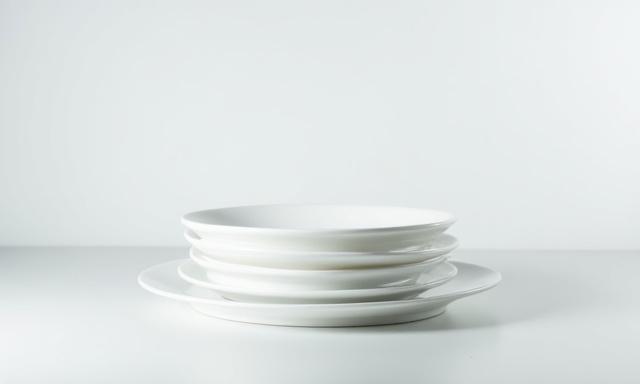 A stack of flawless premium porcelain plates
